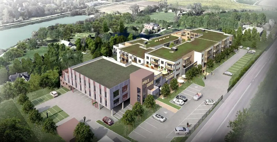 Plateau neuf avec stationnements.